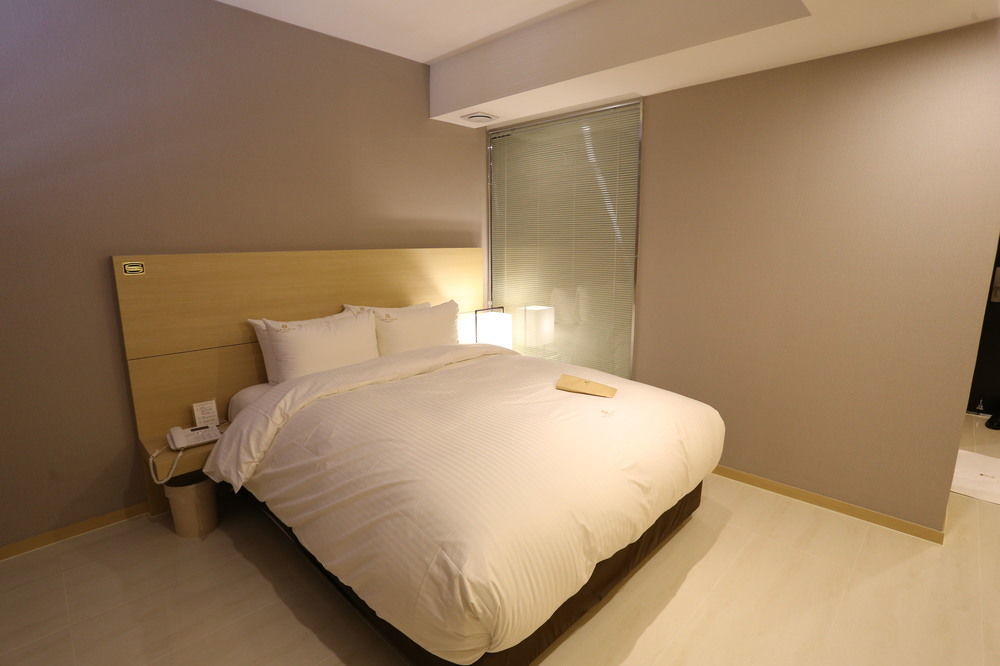 Suwon Top Cloud Hotel Bagian luar foto