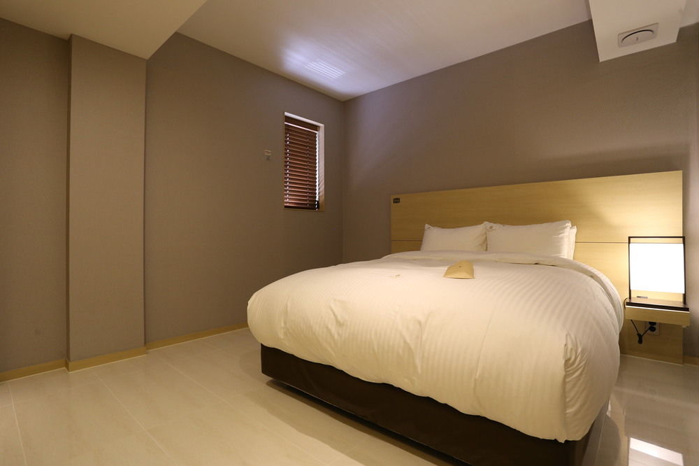Suwon Top Cloud Hotel Bagian luar foto