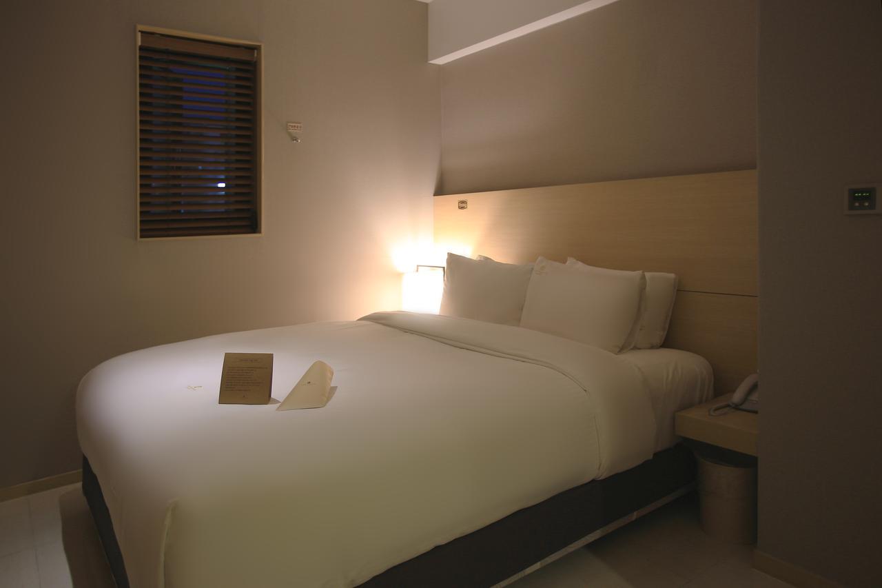 Suwon Top Cloud Hotel Bagian luar foto