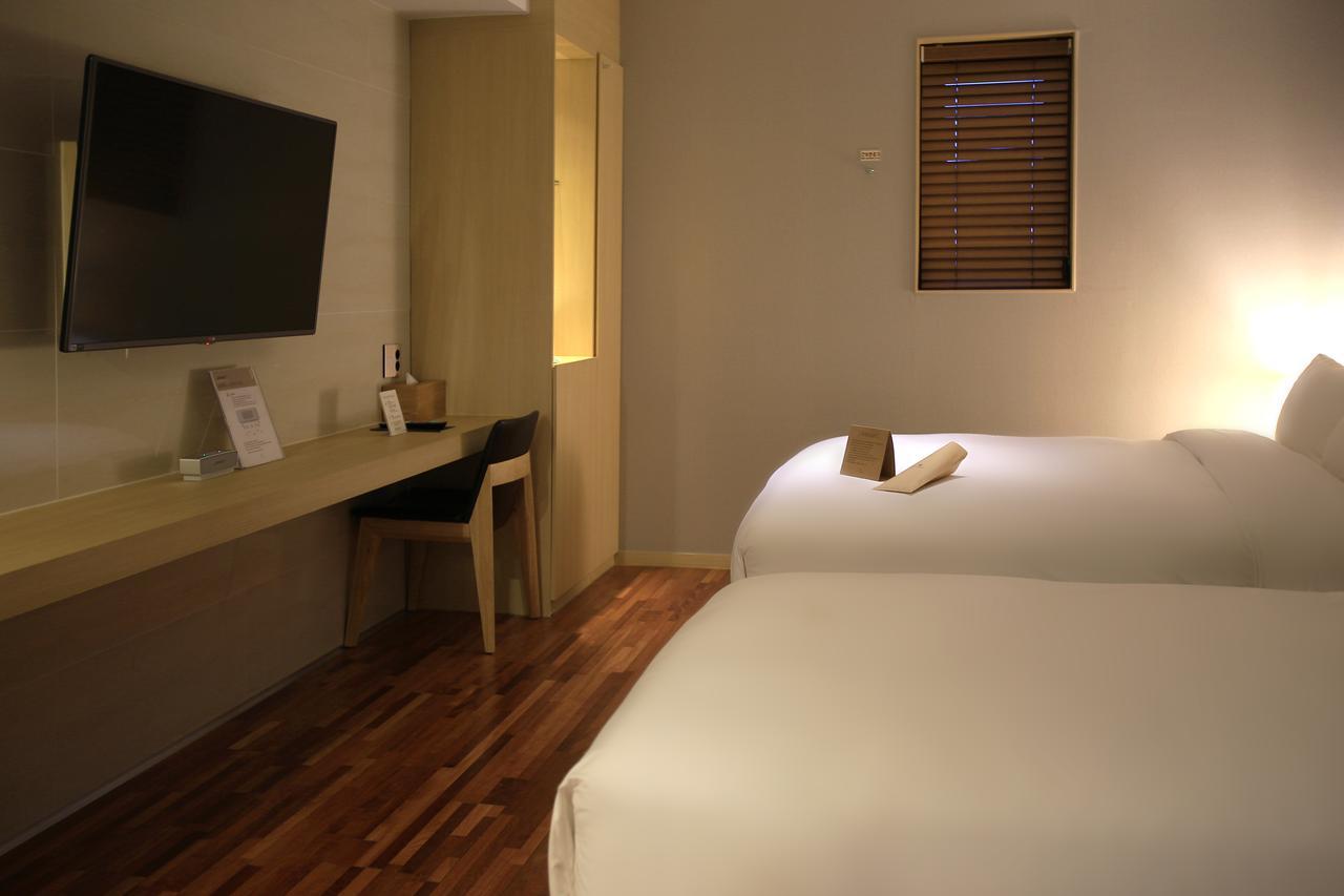 Suwon Top Cloud Hotel Bagian luar foto